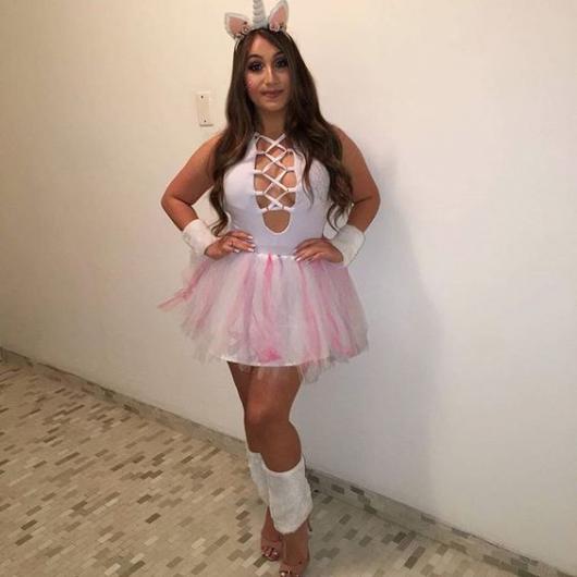 Fantasia de unicórnio branda e rosa.