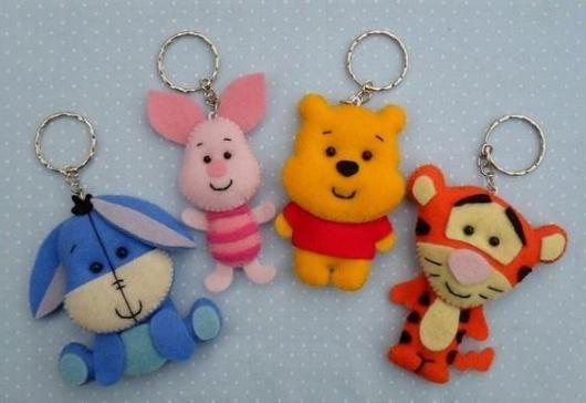 Chaveiros com os personagens do desenho Ursinho Pooh.
