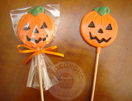 Lembrancinha de halloween pirulito com formato de abóbora