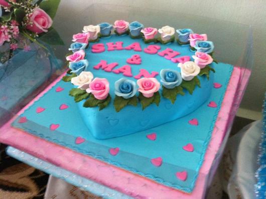 bolo coração azul e rosa