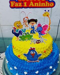 topo de bolo galinha pintadinha com diversos personagens.