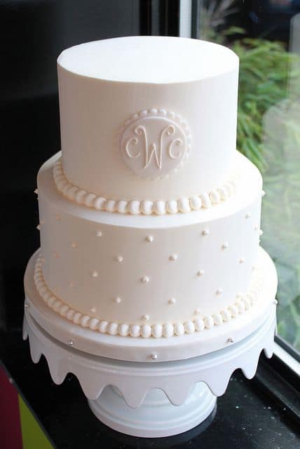 Brasão de casamento no bolo